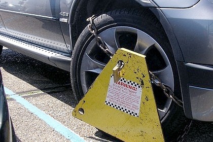 Car with wheel clamp